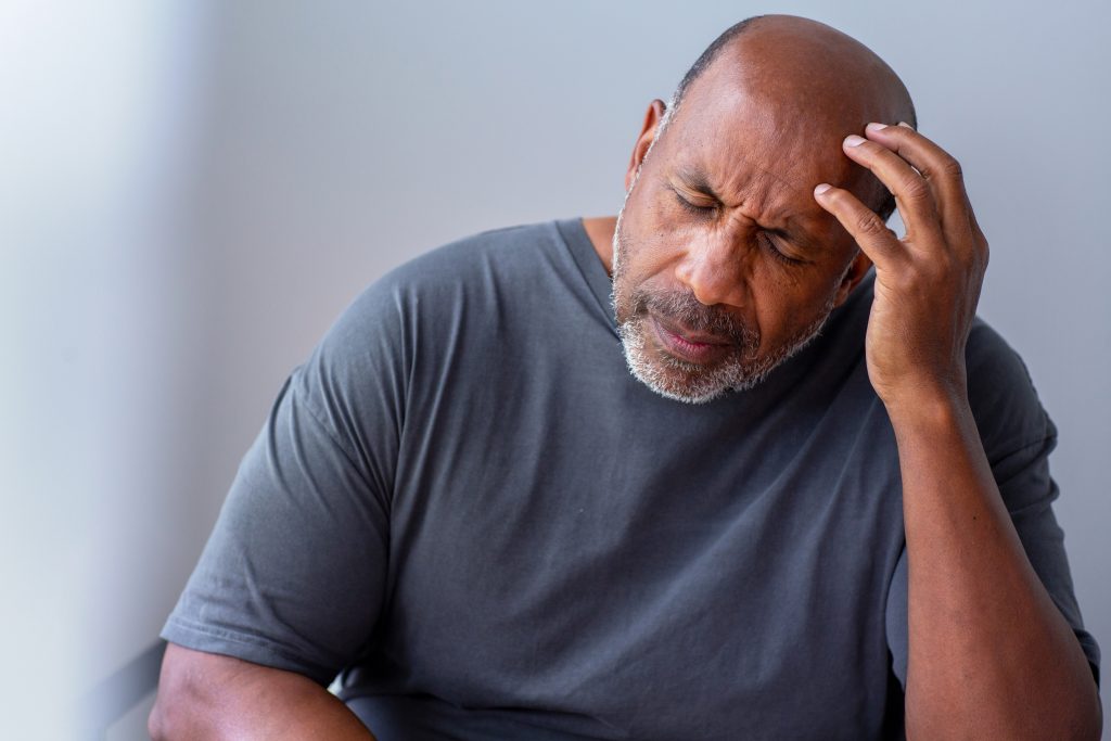 man feeling dizzy